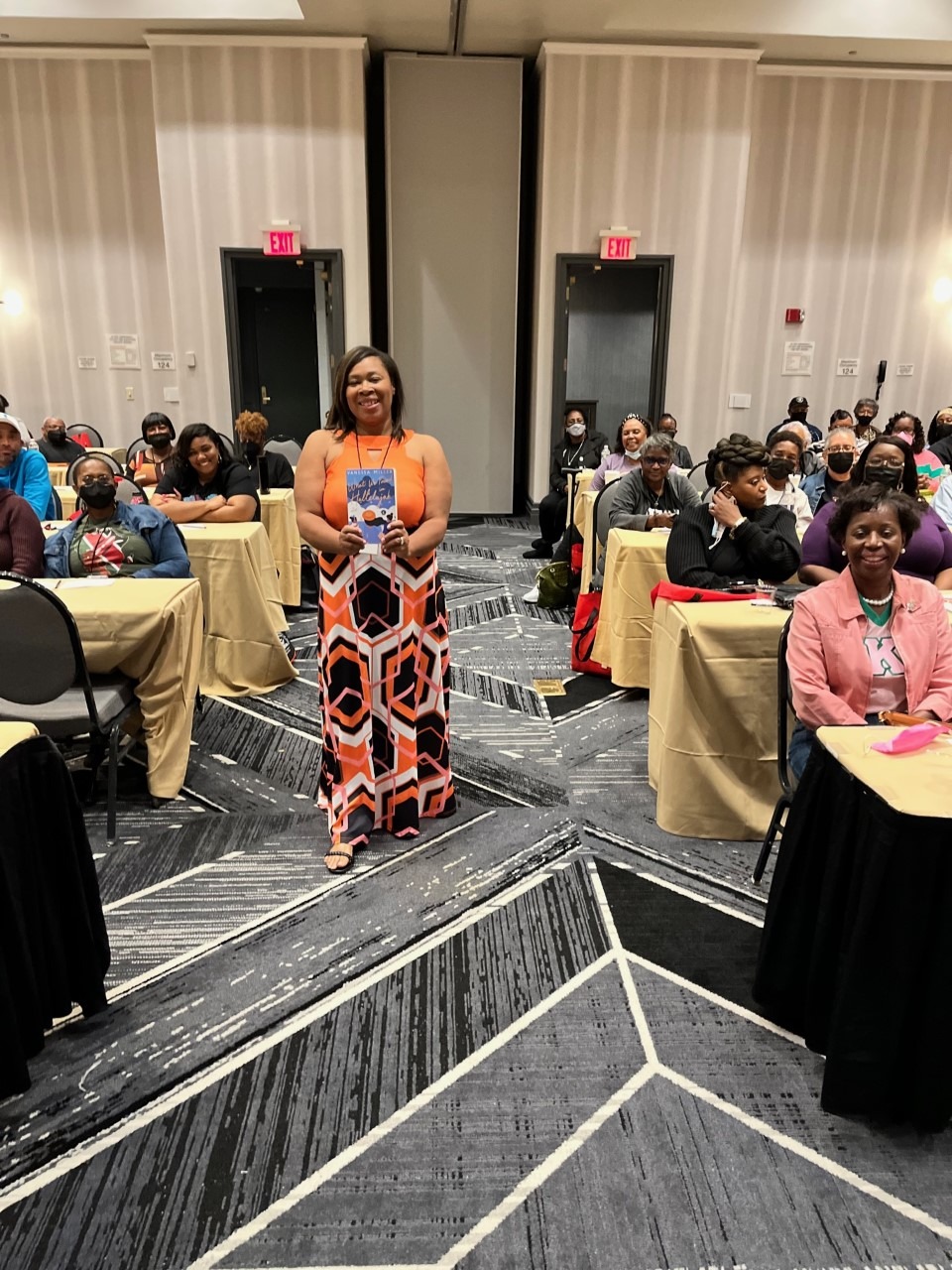 Vanessa Miller speaking at a conference